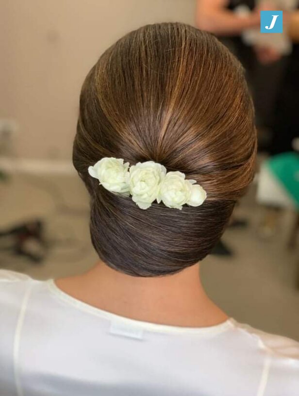 Acconciatura da cerimonia: chignon basso